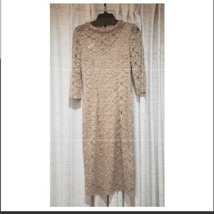 Pale pink lace dress with beaded collar